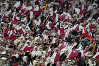 Qatari fans watch the opening match of the Asian Cup between Qatar and Lebanon at the Lusail Stadium in Lusail, Qatar, Friday, Jan. 12, 2024. (AP PhotoAijaz Rahi)