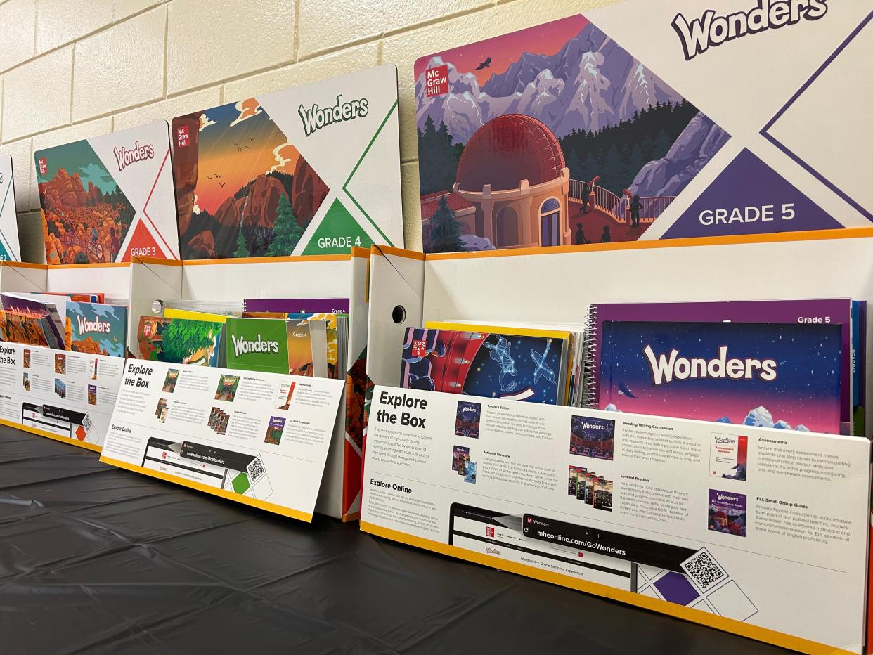 McGraw-Hill's Wonders K-5 literacy curriculum textbooks line a wall at Leiston Shuman Elementary School. The curriculum is one of three potential elementary English language arts (ELA) options that community members can evaluate on Thursday Nov. 16.