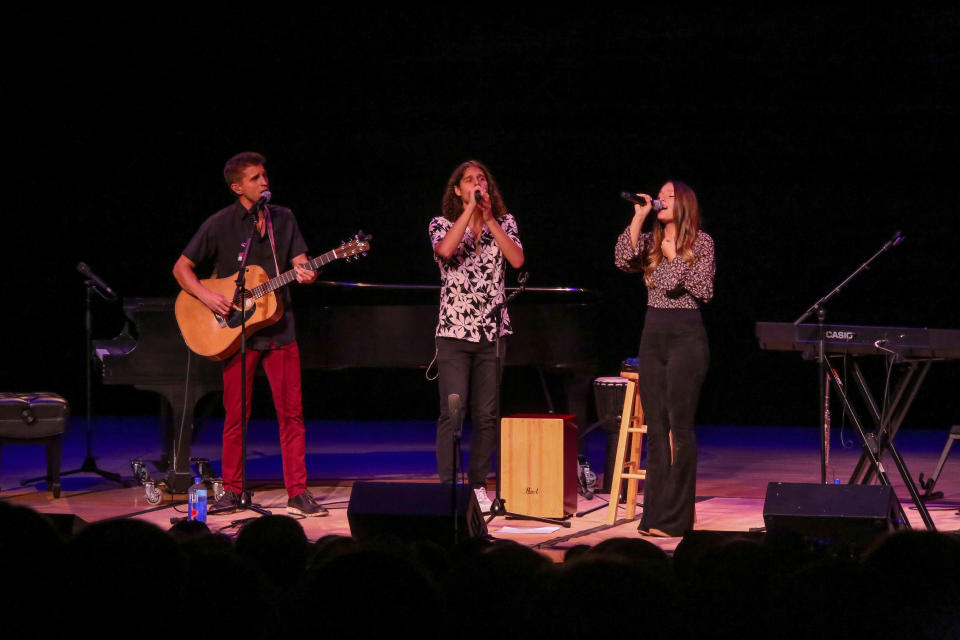 The South Bend-based sibling singing group Girl Named Tom — Caleb, left, Joshua and Bekah Liechty — performs Oct. 1, 2021, at Goshen College's Sauder Concert Hall. Caleb and Joshua both graduated from Goshen College, in 2018 and 2019, respectively, and the trio advanced Nov. 16, 2021, to the final 11 on "The Voice."