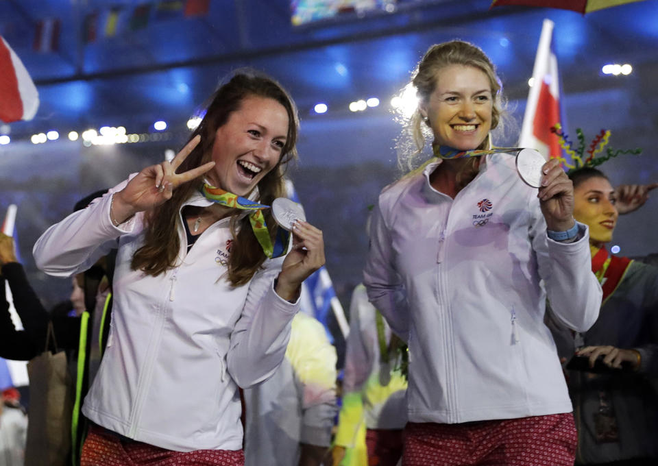 <p>Athletes from Britain show off their medals during the closing ceremony in the Maracana stadium at the 2016 Summer Olympics in Rio de Janeiro, Brazil, Sunday, Aug. 21, 2016. (AP Photo/Matt Dunham) </p>