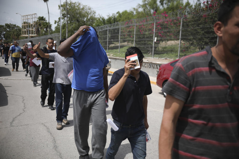 Migrants return to Mexico, using the Puerta Mexico bridge that crosses the Rio Grande river, in Matamoros, Mexico, Wednesday, July 31, 2019, on the border with Brownsville, Texas. The United States government has sent some 800 mostly Central American and Cuban immigrants back to this northern Mexico border city since expanding its controversial plan to this easternmost point on the shared border two weeks ago, according to local Mexican authorities. (AP Photo/Emilio Espejel)
