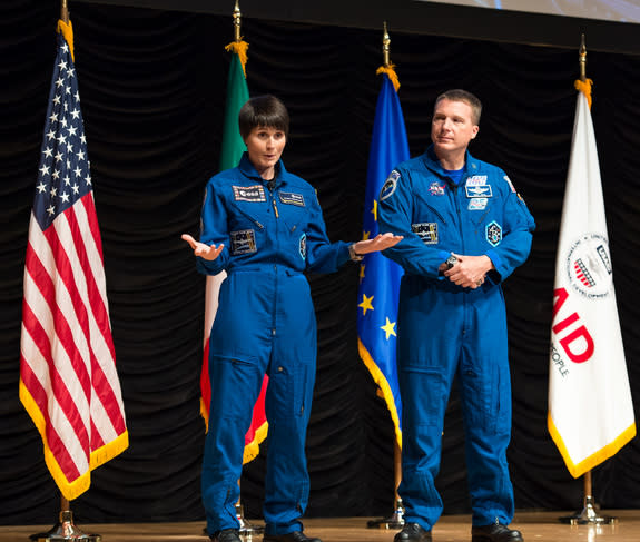 Astronauts Samantha Cristoforetti of the European Space Agency, left, and Terry Virts of NASA speak about their time aboard the International Space Station at the United States Agency for International Development (USAID) town hall on Thursday,