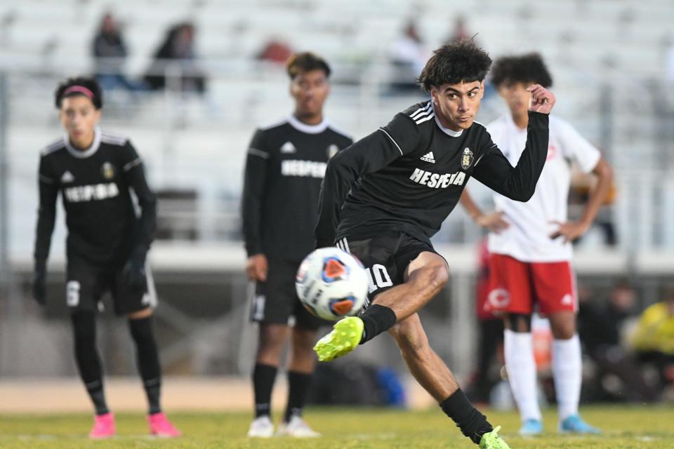 Hesperia's Nick Garcia takes a penalty shot against Corona during the first half Friday, Feb. 11, 2022.