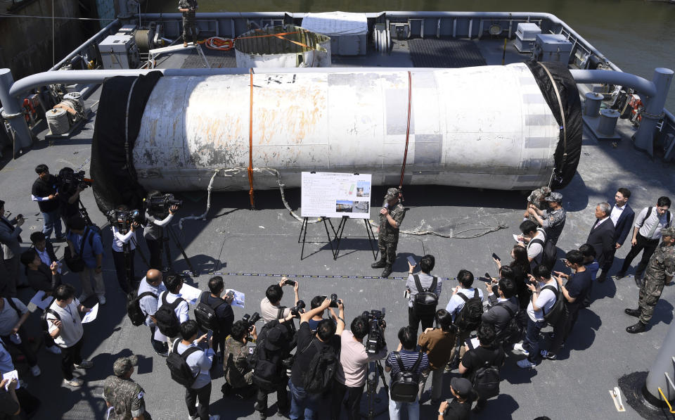 FILE- Objects salvaged by South Korea's military that are presumed to be parts of the North Korean space-launch vehicle that crashed into sea following a launch failure, are displayed at the Navy's 2nd Fleet Command in Pyeongtaek, South Korea, Friday, June 16, 2023. North Korea has told Japan it plans to launch a satellite in the coming days, a possible second try to put a military spy satellite into orbit, Japanese media said Tuesday, Aug. 22. (Yonhap via AP, File)