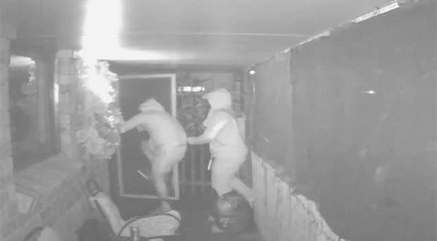 ...before kicking the front door in. Photos: NSW Police