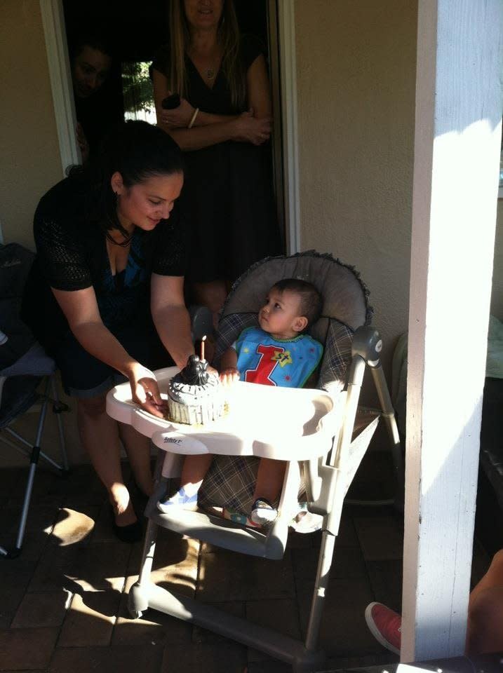 Josanna Webber is in one photo from her son's first birthday party. 