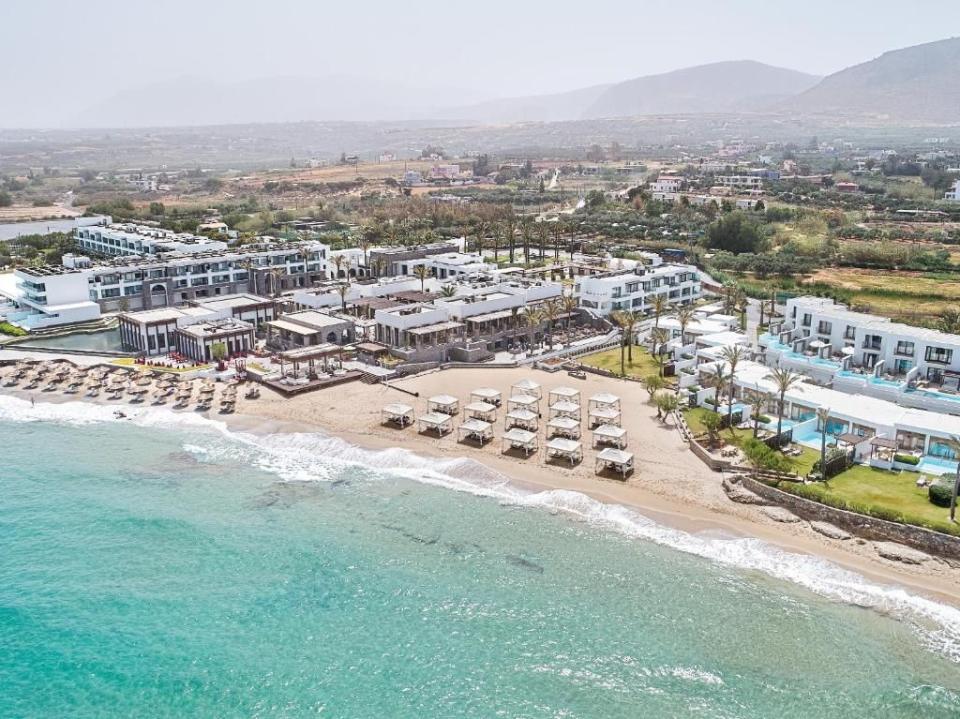 <p>Perched on a private beach on the northern coast of Crete, this sprawling yet stylish resort awash with palm-fringed pools and acres of natural stone offers an ideal retreat for all the family. A short hop from Heraklion, <a href="https://www.booking.com/hotel/gr/amirandes.en-gb.html?aid=1922306&label=best-hotels-greece" rel="nofollow noopener" target="_blank" data-ylk="slk:Amirandes Grecotel Boutique Resort;elm:context_link;itc:0;sec:content-canvas" class="link ">Amirandes Grecotel Boutique Resort</a> makes an ideal base for exploring northern Crete, including the ruins of the Palace of Minos at Knossos, where legend says King Minos sent children to fight the minotaur. </p><p>The rooms, bungalows and villas scattered around the resort are all light, airy and stylishly decorated, while the swankiest villas offer direct beach access or a private pool. Whether it's relaxing by the olympic-sized seawater pool complete with Greco columns, kicking back in the Elixir Alchemy Spa, which offers a range of Ayurvedic treatments, or enjoying one of the many beach bars, restaurants and tavernas dotted around the place, a relaxing time for all is guaranteed.</p><p><a class="link " href="https://www.booking.com/hotel/gr/amirandes.en-gb.html?aid=1922306&label=best-hotels-greece" rel="nofollow noopener" target="_blank" data-ylk="slk:CHECK AVAILABILITY;elm:context_link;itc:0;sec:content-canvas">CHECK AVAILABILITY</a></p>