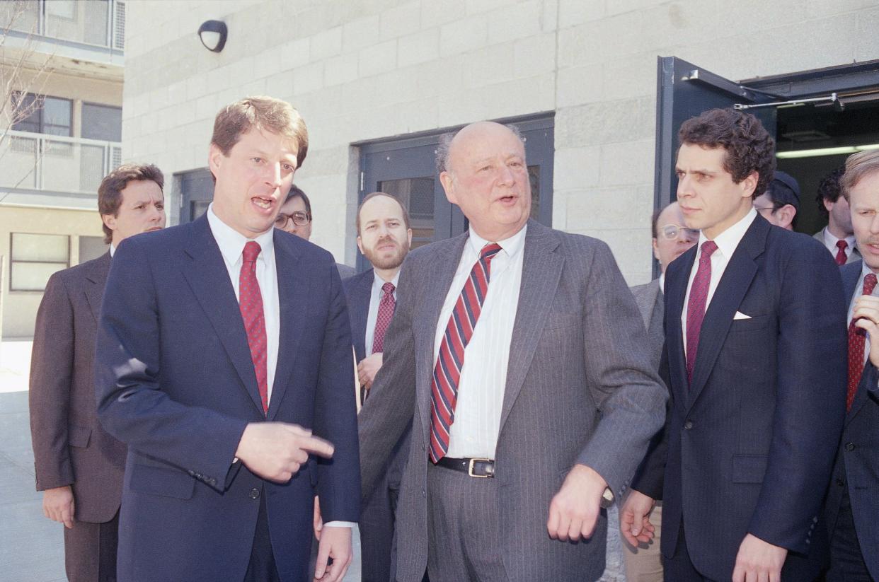 Democratic Presidential Candidate Sen. Albert Gore, left, talks with New York Mayor Ed Koch, center, and Andrew Cuomo at a hearing on aid for the homeless, Monday, March 28, 1988 in Brooklyn, N.Y..  A range of politicians joined the congressional hearing to condemn a proposed federal regulation that would limit funding for families in welfare hotels.