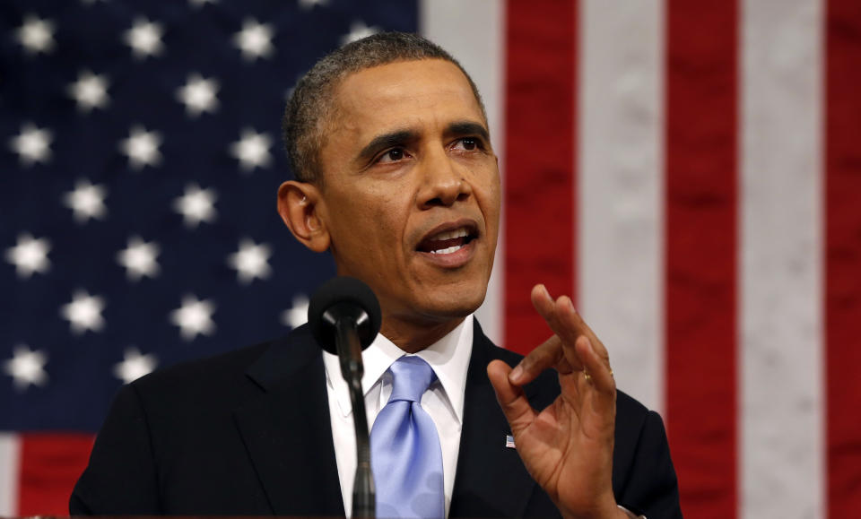 President Barack Obama delivers the State of Union address before a joint session of Congress in the House chamber Tuesday, Jan. 28, 2014, in Washington, as Vice President Joe Biden, and House Speaker John Boehner of Ohio, listen. (AP Photo/Larry Downing, Pool)