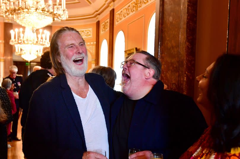 Actor David Threlfall and comedian Johnny Vegas posed together at the Freedom of the City of Liverpool at Liverpool Town Hall to celebrate Sue Johnston's award