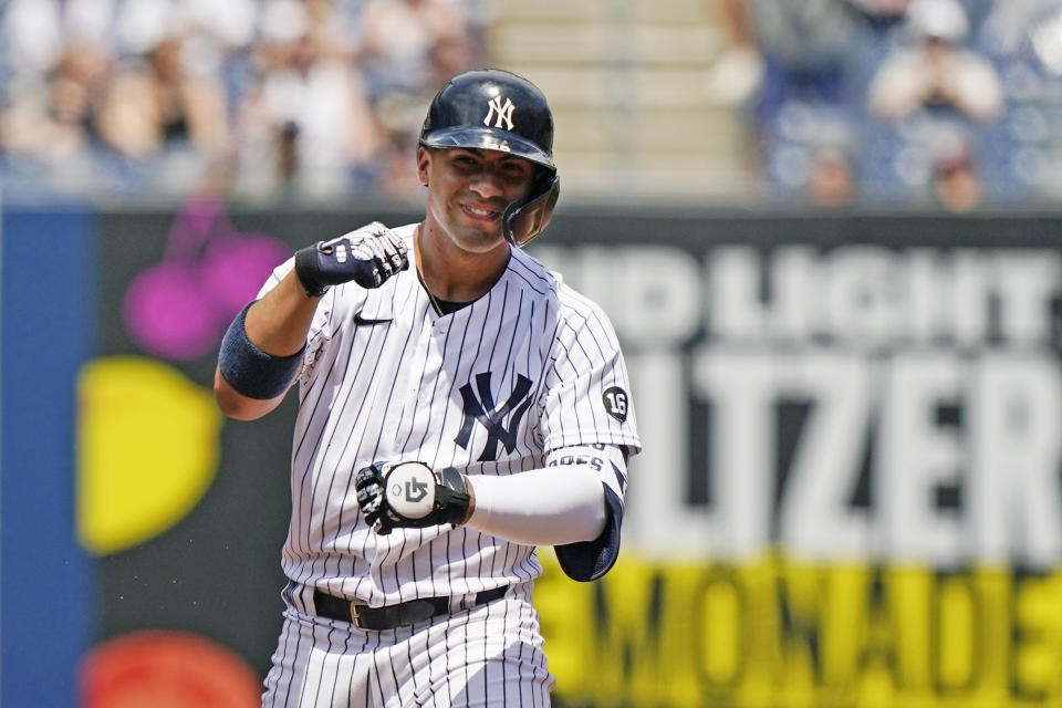 New York Yankees' Gleyber Torres gestures from second base after hitting a two-run double during the first inning of a baseball game against the Chicago White Sox, Sunday, May 23, 2021, at Yankee Stadium in New York. (AP Photo/Kathy Willens)