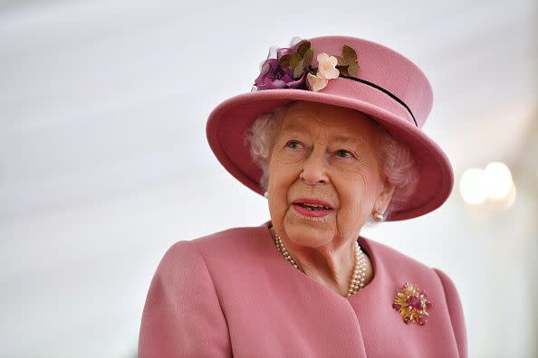 2020: Britain's Queen Elizabeth II speaks with staff during a visit to the Defence Science and Technology Laboratory at Porton Down science park on October 15, 2020, near Salisbury, England.