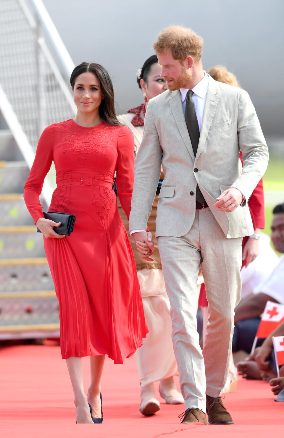 The Duchess wears a Self Portrait dress in Tonga [Photo via Getty Images]