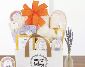 <p>winecountrygiftbaskets.com</p><p><strong>$59.95</strong></p><p><a href="https://www.winecountrygiftbaskets.com/gift-baskets/a-day-off-spa-basket/523" rel="nofollow noopener" target="_blank" data-ylk="slk:Shop Now" class="link ">Shop Now</a></p><p>Bring the spa into her home with the ultimate relaxation gift set. An assortment that includes body lotion, bar soap, bath caviar, body scrub, foot soak, shower gel, and a mesh sponge fill this charming tote bag. </p>