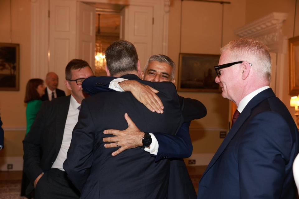 Prime Minister Sir Keir Starmer hugs Mayor of London Sadiq Khan (Ian Vogler/Daily Mirror/PA Wire)