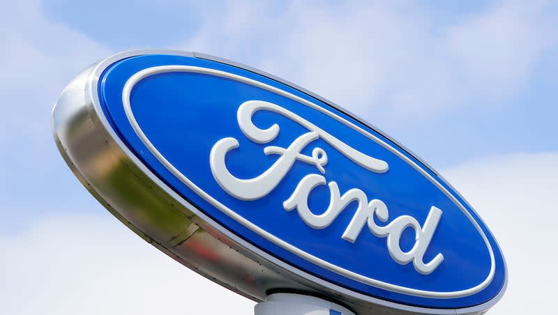 A Ford sign is shown at a dealership in Springfield, Pa., Tuesday, April 26, 2022.  Ford is recalling nearly 43,000 small SUVs, Wednesday, April 10, 2024, because gasoline can leak from the fuel injectors onto hot engine surfaces, increasing the risk of fires. But the recall remedy does not include repairing the fuel leaks.