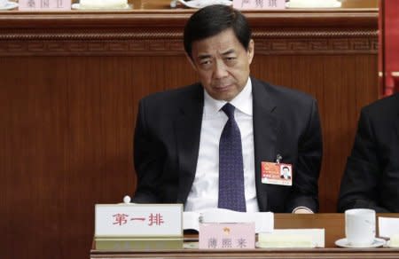 Bo Xilai pauses as he attends a plenary meeting of China's parliament, the National People's Congress, at the Great Hall of the People in Beijing March 10, 2011.   REUTERS/Jason Lee