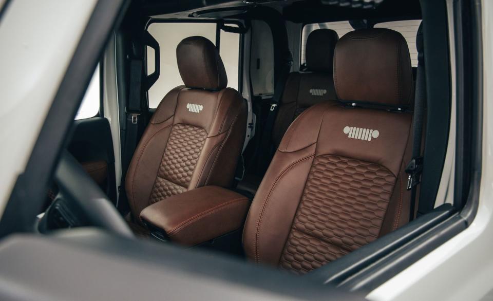 <p>The seats are embroidered with a Tungsten-colored (dark gray) Jeep grille logo.</p>