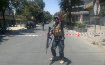 <p>An Afghan policeman sets up a perimeter at the site of an explosion in Kabul on July 31, 2017.<br> A series of explosions and the sound of gunfire shook the Afghan capital on July 31, with a security source telling AFP that a suicide bomber had blown himself up in front of the Iraqi embassy. “Civilians are being evacuated” from the area as the attack is ongoing, said the official, who declined to be named.<br> (Shah Marai/AFP/Getty Images) </p>