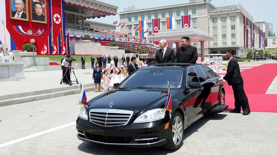 North Korean leader Kim Jong Un and Russian President Vladimir Putin exit a welcome ceremony at Kim Il Sung square in Pyongyang on June 19. - Gavriil Grigorov/Pool/AFP/Sputnik/Getty Images