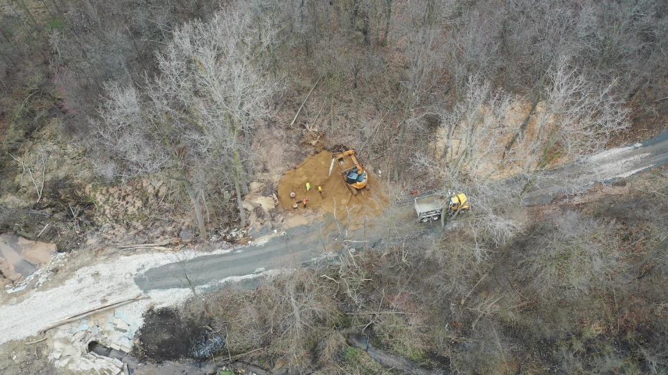 Crews work to repair a water main break on March 18, 2024, that led to a widespread boil water advisory in Grand Rapids.