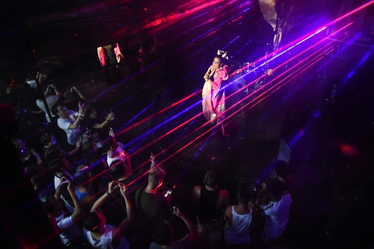 Bathed in a pink spotlight, the cabaret singer at Phuket's 'ZAG' bar lip-syncs the top notes of a popular Mandarin love song, delighting the crowd of gay Chinese tourists who have escaped judgement at home for sexual freedom in Thailand