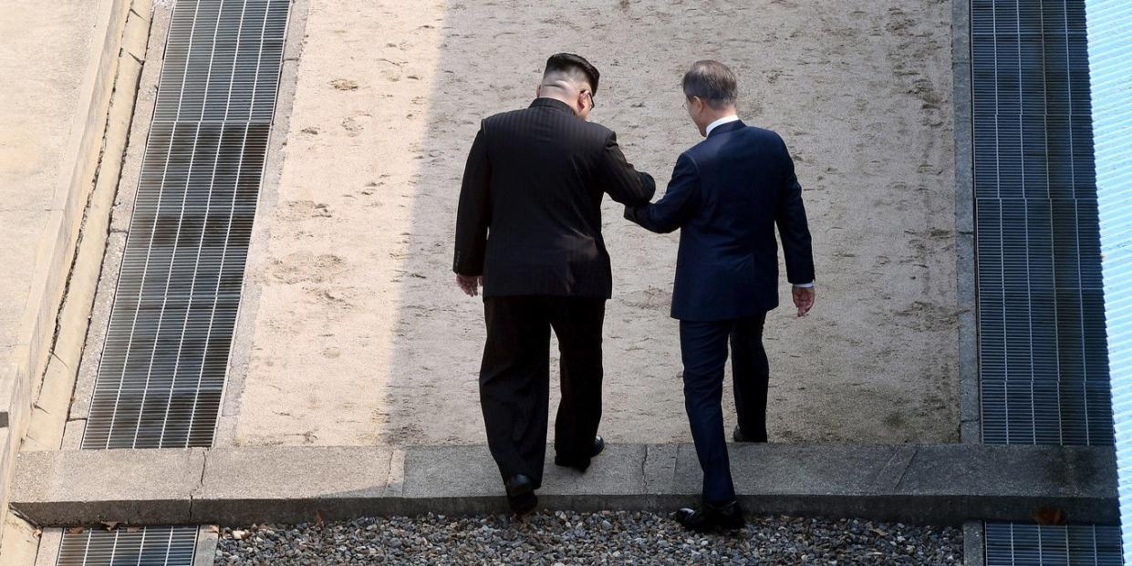 Kim and Moon step into North Korea