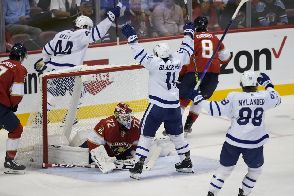 Toronto Maple Leafs center Colin Blackwell (11) celebrates his goal on Florida Panthers goaltender Sergei Bobrovsky (72) during the second period of an NHL hockey game Tuesday, April 5, 2022, in Sunrise, Fla. (AP Photo/Rebecca Blackwell)