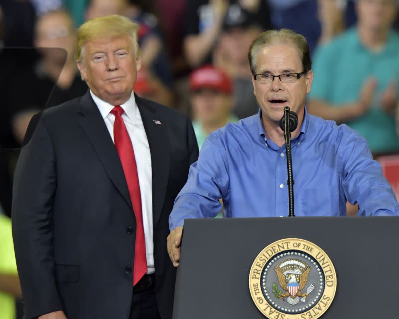 With President Trump at his side, Republican Mike Braun speaks to a rally in Evansville, Ind., in August. (Photo:Timothy D. Easley/AP)