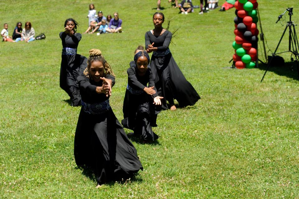  Second Baptist Church of Doylestown praise dancers perform at Sunday's Juneteenth celebration at the Mercer Museum in Doylestown Pa.