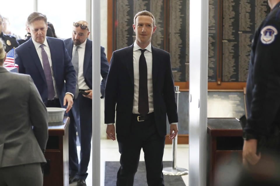 Facebook CEO Mark Zuckerberg arrives to testify before a House Financial Services Committee hearing on Capitol Hill in Washington, Wednesday, Oct. 23, 2019, on Facebook's impact on the financial services and housing sectors. (AP Photo/Andrew Harnik)