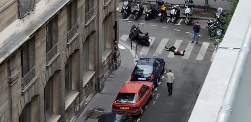 A friend of the man who carried out a deadly knife attack in Paris was charged with "associating with criminal terrorists" while two women were detained for questioning as the investigation gathers speed