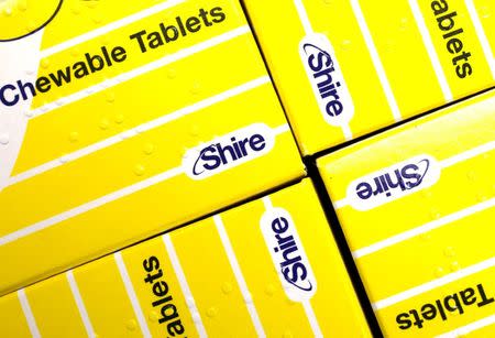 FILE PHOTO: Vitamins made by Shire are displayed at a chemist's in northwest London, Britain July 11, 2014. REUTERS/Suzanne Plunkett/File Photo/File Photo