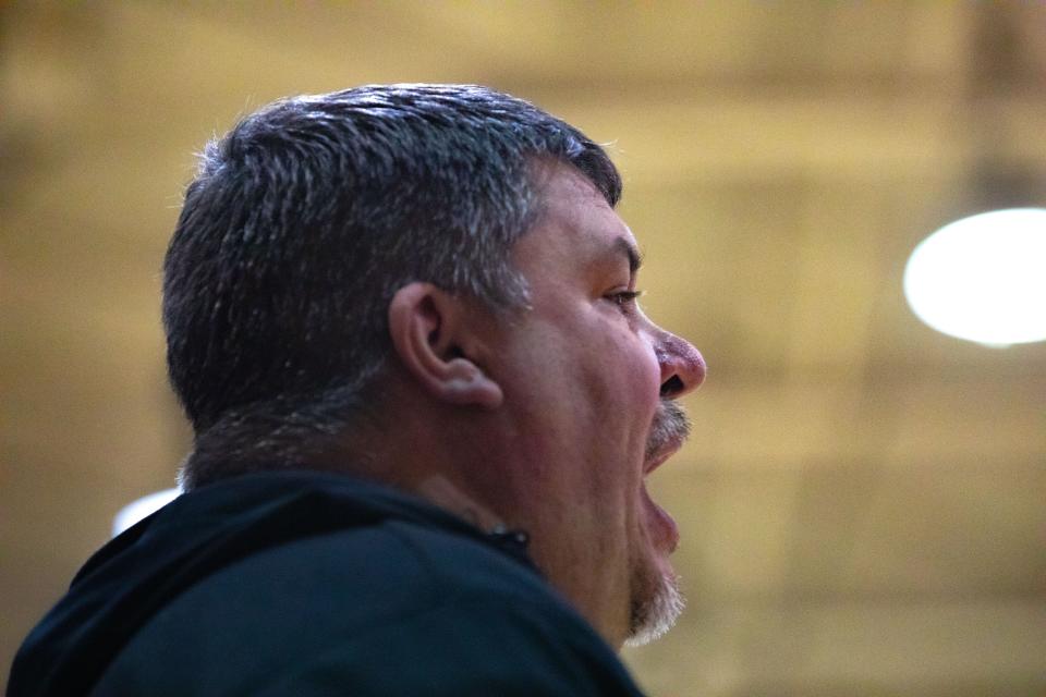 Bosse Head Coach Shane Burkhart yells onto the court during a home game against Harrison High School on Friday, Feb. 17, 2023.