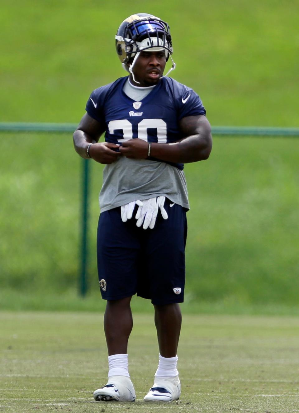 St. Louis Rams running back Zac Stacy pauses between drills during during an organized team activity on June 12, 2014.