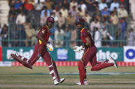 West Indies Shamarh Brooks, left, and Shai Hope run between the wickets during the first one day international cricket match between Pakistan and West Indies at the Multan Cricket Stadium, in Multan, Pakistan, Wednesday, June 8, 2022. (AP Photo/Anjum Naveed)