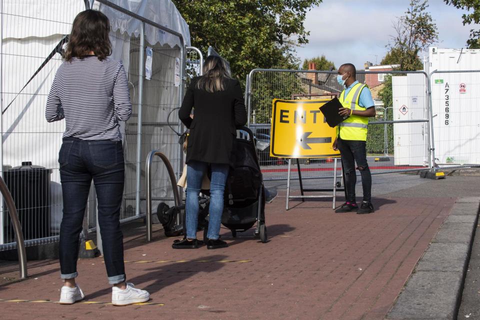 People queuing for a coronavirus testing centre in Walthamstow (Lucy Young)