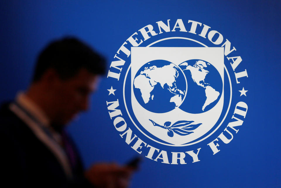 Logo of IMF at the International Monetary Fund. The FTSE was down after its warning