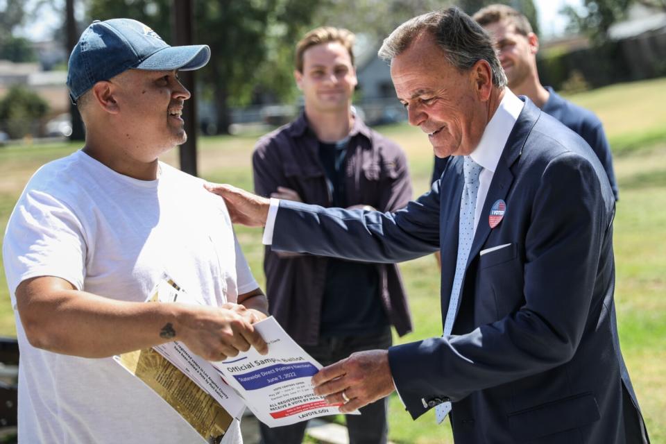 Rick Caruso speaking with supports on Tuesday.