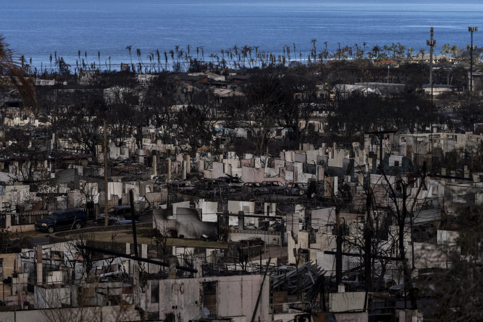 Homes consumed in recent wildfires are seen in Lahaina, Hawaii, Wednesday, Aug. 16, 2023. A week after a wildfire all but incinerated the historic town of Lahaina, communication on the island was still difficult. (AP Photo/Jae C. Hong)