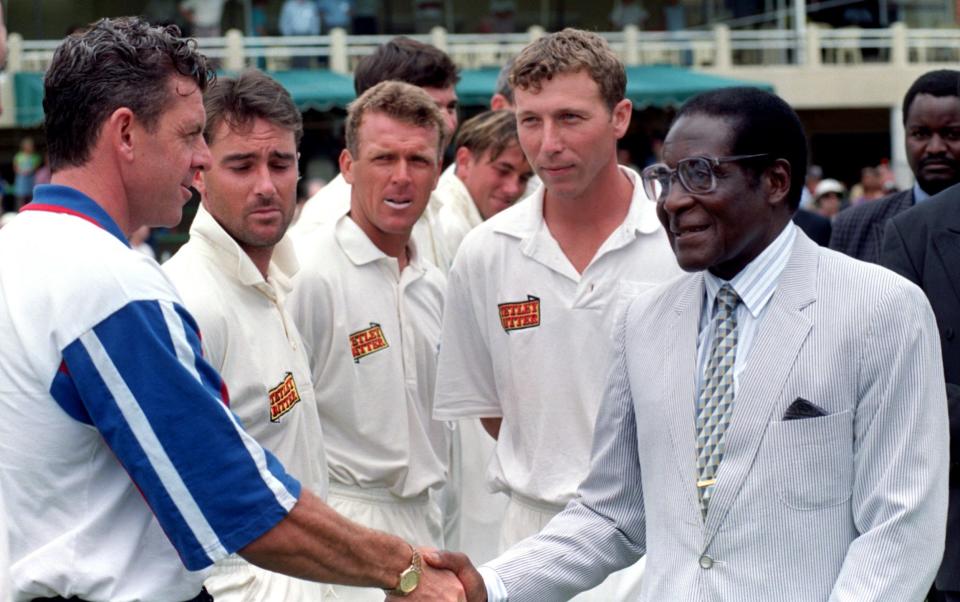 Thorpe, Stewart, Atherton and Wayne Morton meet Robert Mugabe