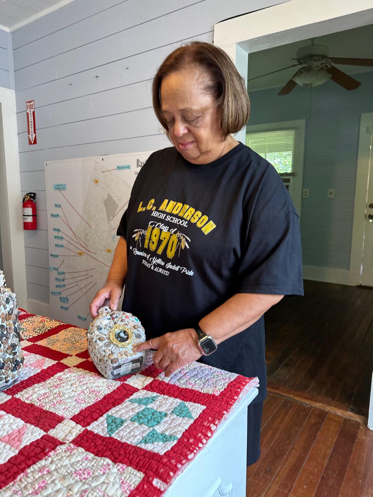 Belinda Davis describes her memory jug that honors her mother. Davis said her mother sacrificed a lot of her life to support her family and their dreams.