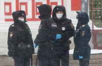 Police officers patrol streets in Moscow