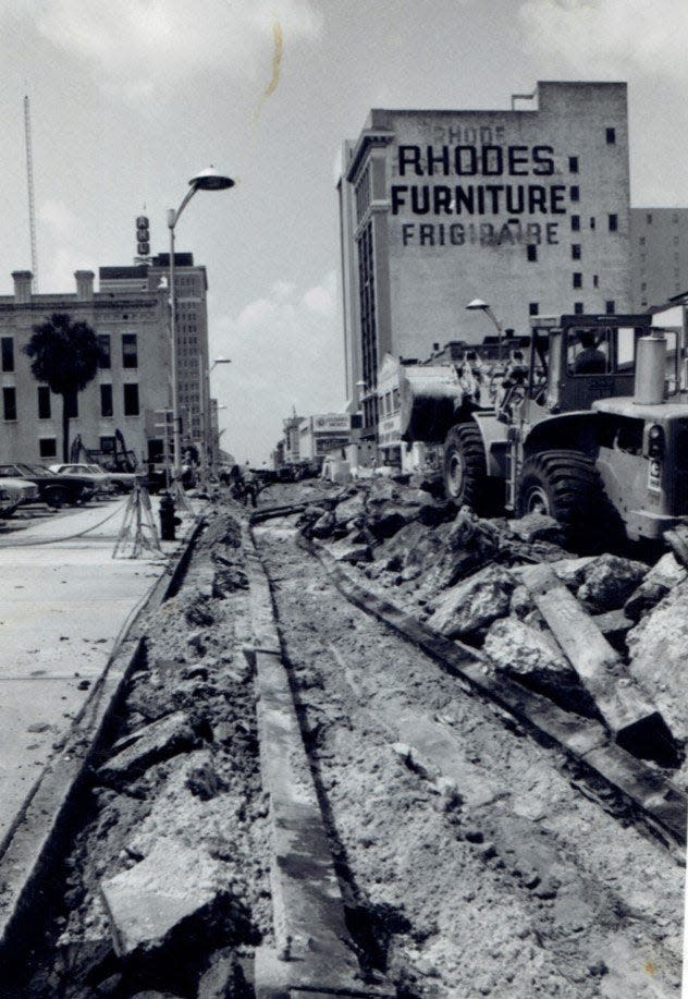 Michael Lissner took this photograph of North Main Street, looking south from Duval Street, being torn up as the old trolley tracks that ran along Main Street were removed while the road was repaved. As he writes: "My guess it was in the late '70's or early '80's. At the time, my family operated The Young Men's Shop, a menswear store for many years located downtown. Needless to say, the 'progress' caused major traffic disruptions for many months."