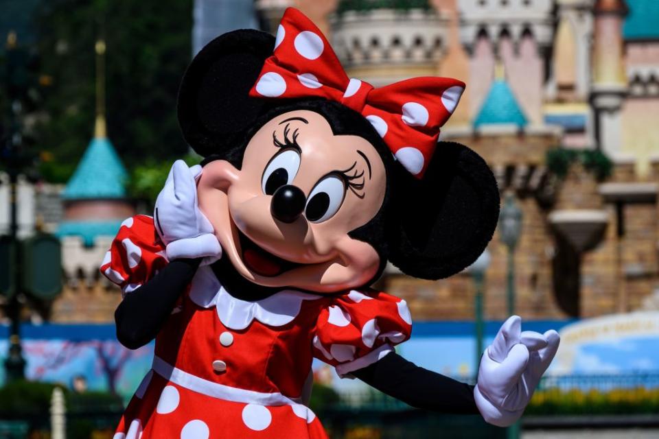 Minnie Mouse wears a version of her iconic outfit at Hong Kong Disneyland on June 18, 2020. (Photo: Anthony Wallace/AFP via Getty Images)