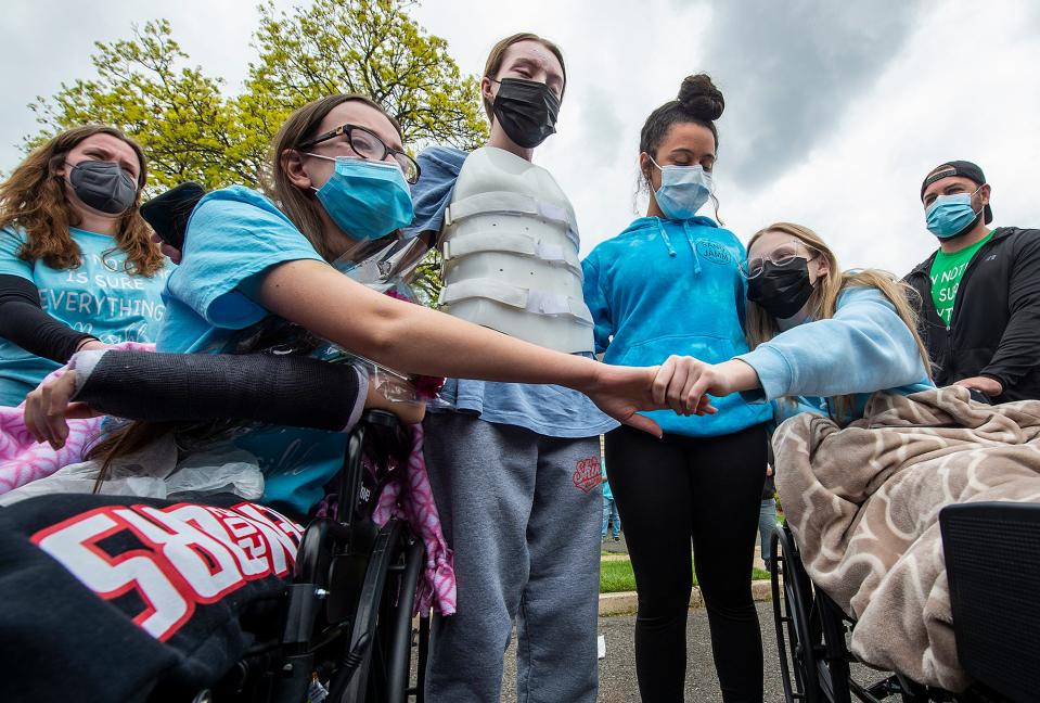 Reunion of Neshaminy High School juniors who were injured from a DUI crash accident, March 2021, were Julia Aquilone, (second from the left), 17,  Julianna Mazzoni, 17, Angelique Corsina, 17, and Taylor Donnelly, 17, Sunday, April 25, 2021.