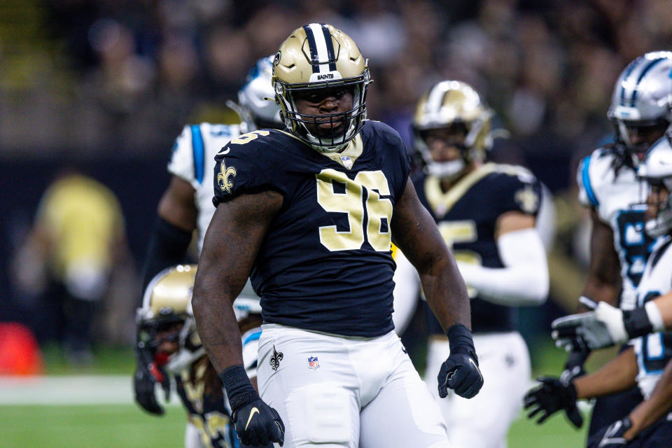 Jan 8, 2023; New Orleans, Louisiana, USA; New Orleans Saints defensive end <a class="link " href="https://sports.yahoo.com/nfl/players/32490" data-i13n="sec:content-canvas;subsec:anchor_text;elm:context_link" data-ylk="slk:Carl Granderson;sec:content-canvas;subsec:anchor_text;elm:context_link;itc:0">Carl Granderson</a> (96) reacts to making a tackle against Carolina Panthers running back D’Onta Foreman (33) during the first half at Caesars Superdome. Mandatory Credit: Stephen Lew-USA TODAY Sports