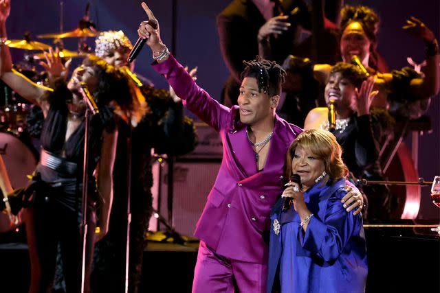 <p>Amy Sussman/Getty Images</p> Jon Batiste and Ann Nesby at the 2024 Grammys.