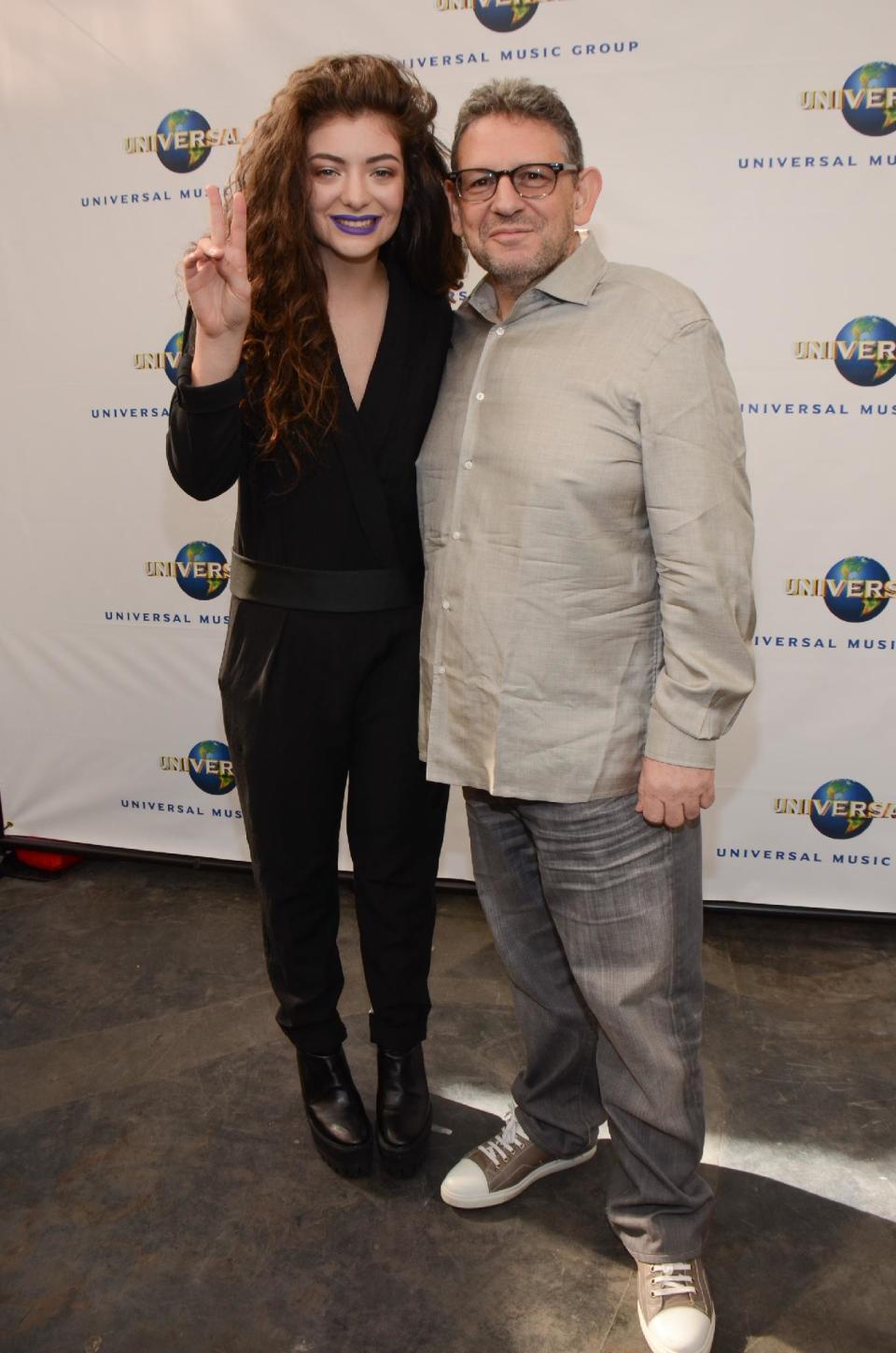 Lorde and Lucian Grainge seen at Universal Music Brunch to Celebrate the 56th Annual GRAMMY Awards, on Saturday, January 25, 2014 in Hollywood, CA. (Photo by Tonya Wise/Invision/AP)