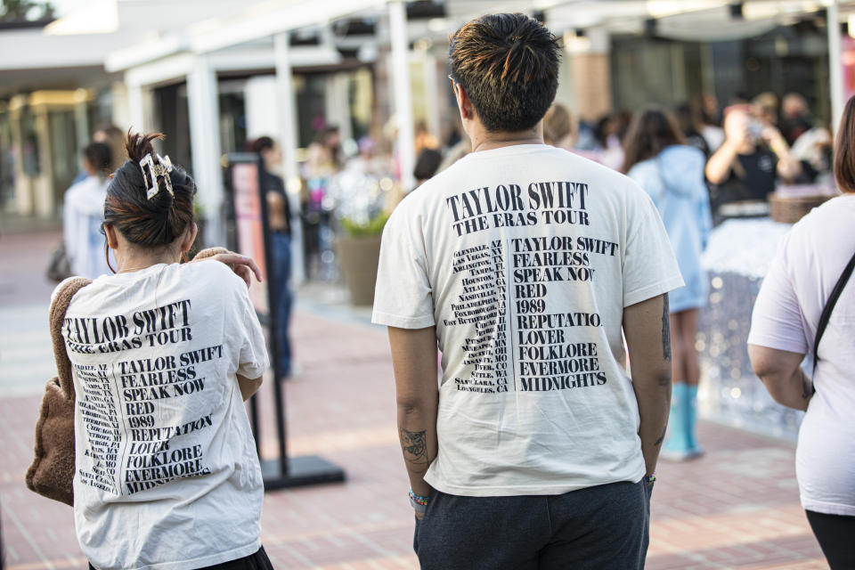 people with taylor swift eras tour t-shirts